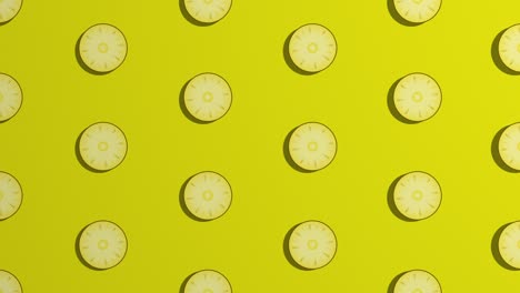 se rotan rebanadas de piña. patrón sobre fondo amarillo
