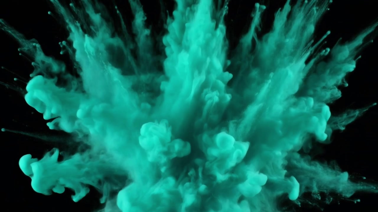 Turquoise Powder Explosion Against Black Background