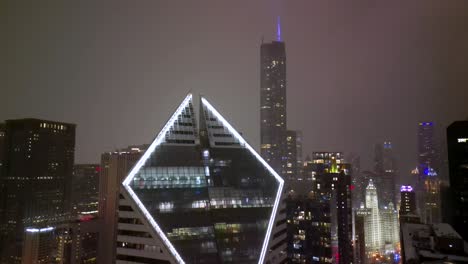 the iconic diamond-shaped skyscraper - crain communications building on north michigan avenue in downtown chicago, illinois, usa