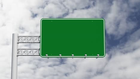 black green road sign with clouds moving fast in background