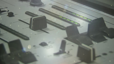 compuesto digital de un mezclador de dj y partículas coloridas
