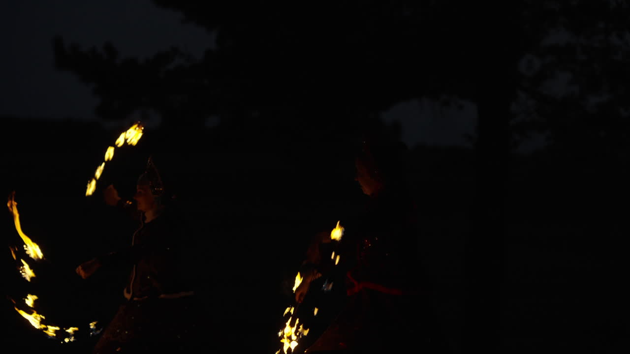 Fire Dancers at Night
