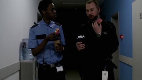 team in uniform relaxing on the corridor