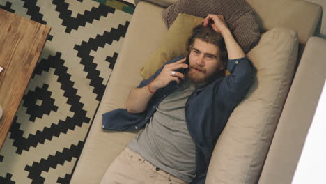 Top View of Bearded Man Chatting on Phone
