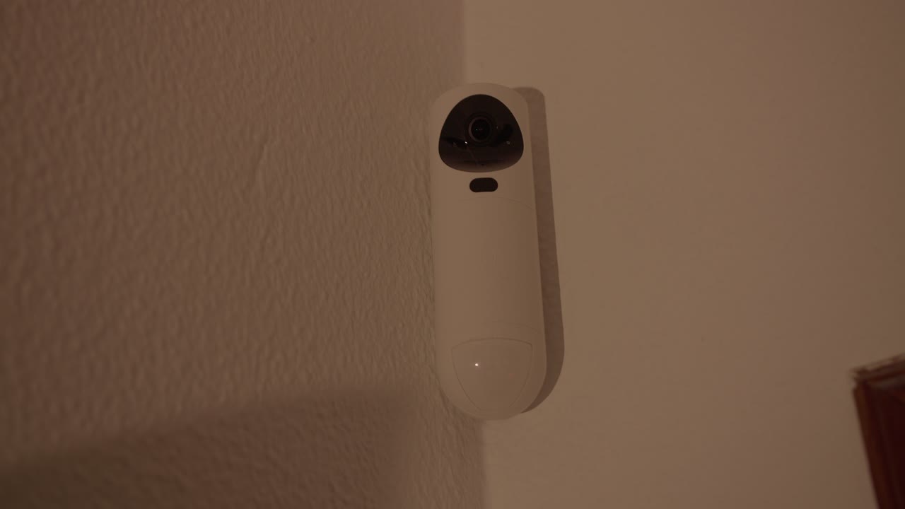 Smart Home Security Camera with Blinking Red and Blue Lights
