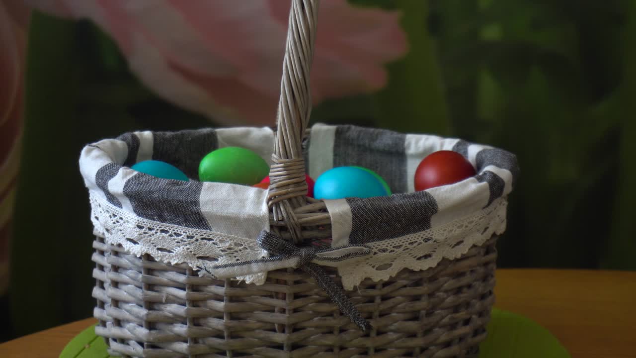Basket with multi-colored Easter eggs