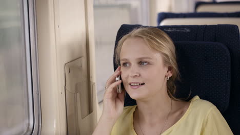 woman talking on the phone in the train