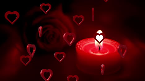 animación de corazones rojos que se mueven sobre una vela y una rosa roja