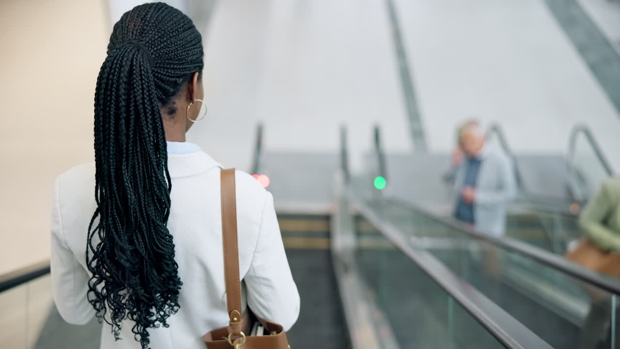 Travel, escalator and business woman in an office