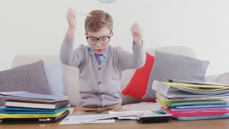 boy as business executive verifying document 4k