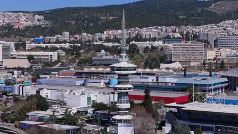 Rotating-aerial-view-of-the-OTE-tower-in-Thessaloniki,-Greece