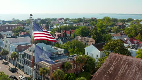 usa flag in charleston, aerial pullback reveals st