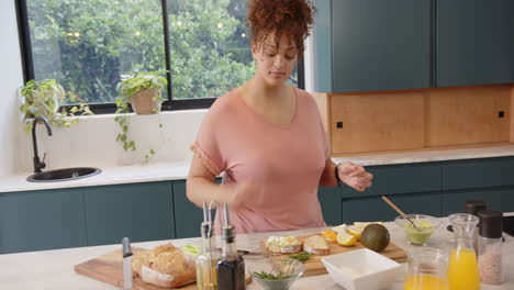 slicing vegetables, woman preparing healthy meal in modern kitchen