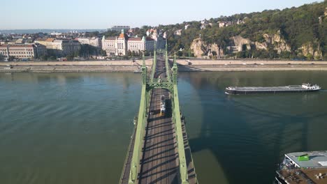 forward drone shot above liberty bridge in budapest, hungarian capital city