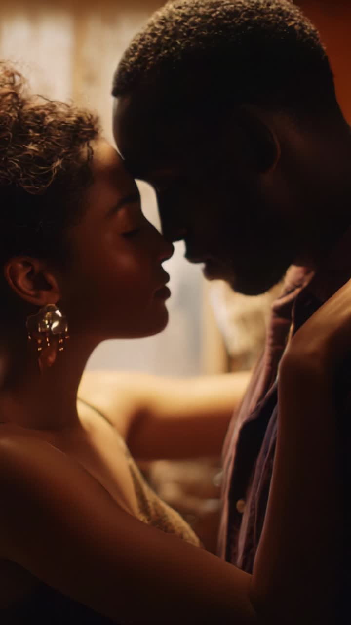 A Passionate Moment Captured: An Intimate Connection Between Two Souls in a Softly Lit Room, Highlighting the Depth of Emotion and Vulnerability in Their Embrace