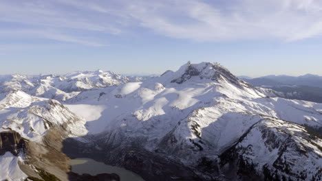 Snow-Capped-Mountain-Ridges-Under-Bright-Sunny-Day-At-Vancouver,-Pemberton,-Whistler-And-Squamish-In-BC-Canada-During-Winter