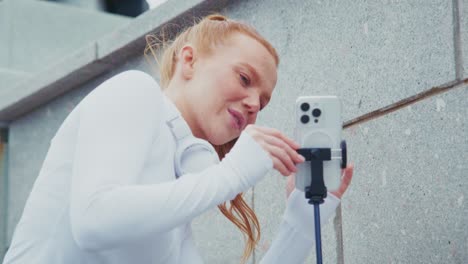 woman using phone for vlogging