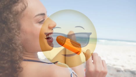 Woman-on-beach-with-emoticon-