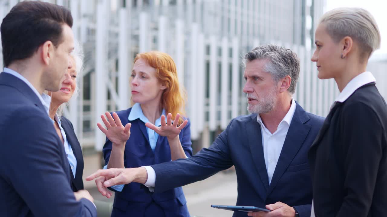 Diverse business team having an outdoor discussion
