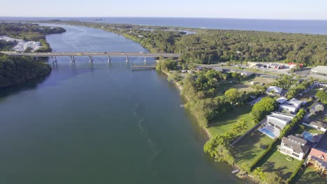 A-View-of-Barneys-Point-Bridge-on-the-Tweed-River,-New-South-Wales,-Australia-Aerial-Pullback