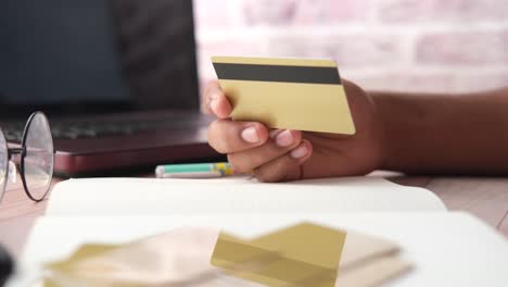 person holding credit card