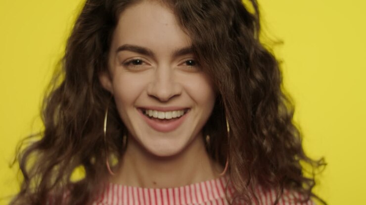 Laughing woman looking in camera