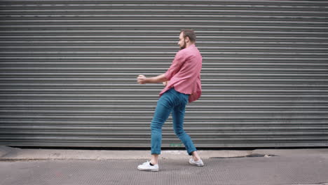 dance loop funny man dancing in street having fun celebrating with funky looping dance 4k