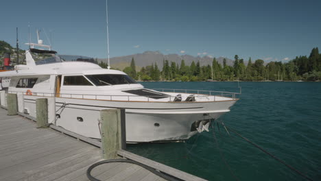 Yacht-Moored-In-The-Marina-In-Queenstown,-South-Island,-New-Zealand