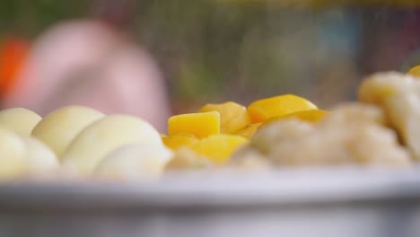 Close-up-shot-of-steamed-Potatoes,-Tofu-and-Eggs-steaming-in-a-steam-pot---Indonesian-street-food-called-siomay