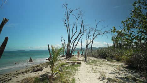 Woman visiting tropical beach during summer in Costa Rica, Cahuita
