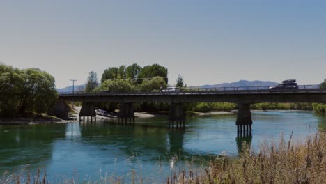 a bridge over beautiful clutha river in new zealand