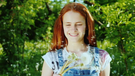 A-Girl-With-Bright-Red-Hair-Has-Fun-Playing-With-Dandelion-Flowers-3