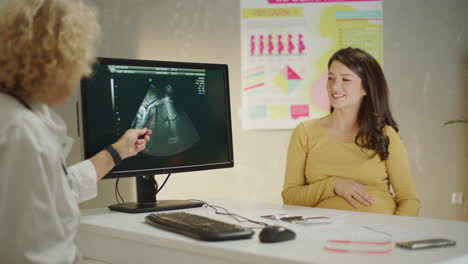 pregnant woman at doctor's appointment