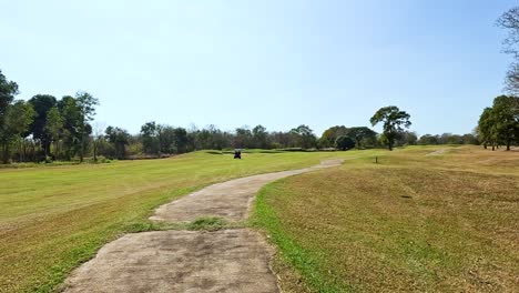 a serene golf course with a winding path