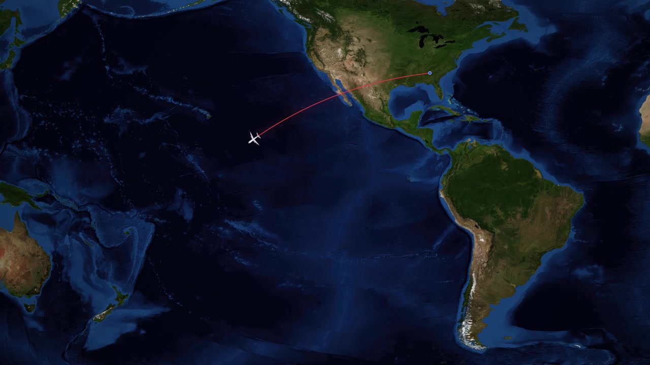A red line tracks a commercial airplane flying from Atlanta to Auckland over the Pacific