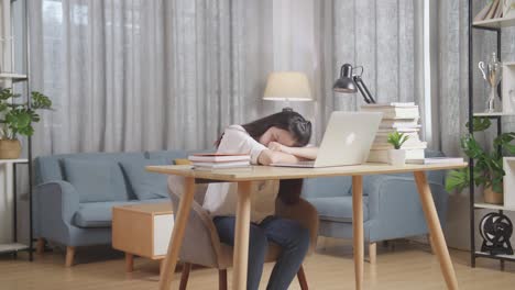 tired student sleeping at desk