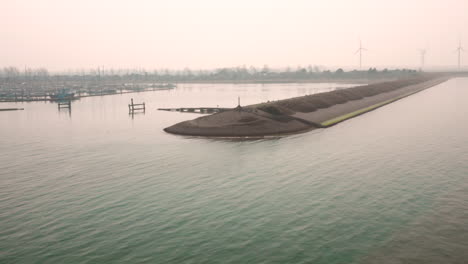 aerial: harbour and vacation park during hazy spring day