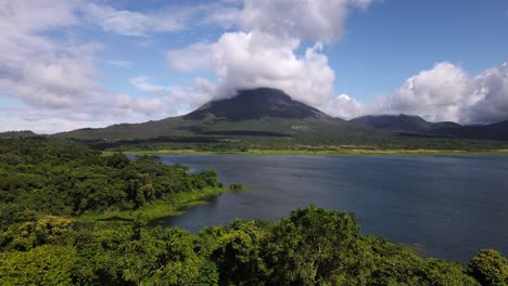 long video of arenal volcano behind costa rica's largest man made lake