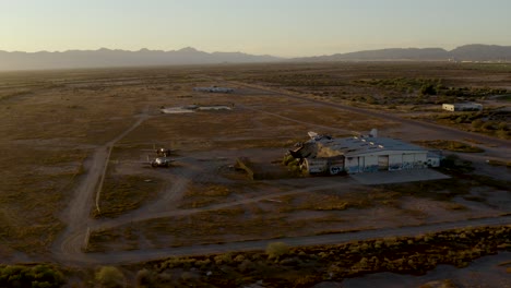 abandoned airfield with planes boneyard aerial