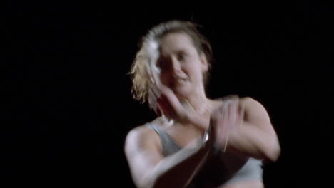 a woman does an aerobic workout