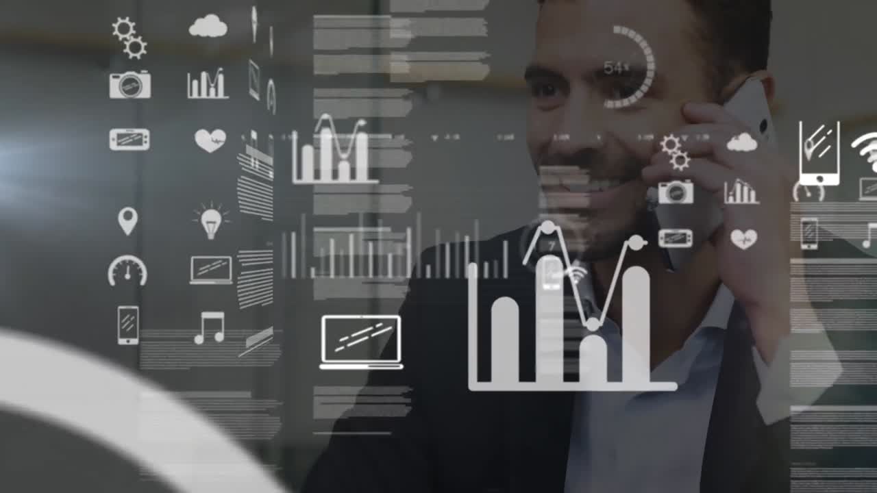 Animation of data processing over happy caucasian businessman talking on smartphone at office