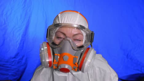 scientist virologist in respirator. woman close up look, wearing protective medical mask. concept health safety n1h1 coronavirus epidemic 2019 ncov.