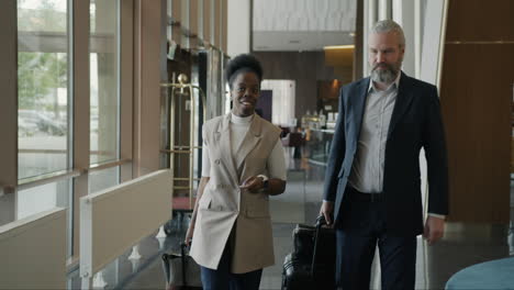 hotel lobby scene with business couple