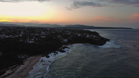 coastline aerial drone above puerto escondido cliff punta beach mexico sunlight