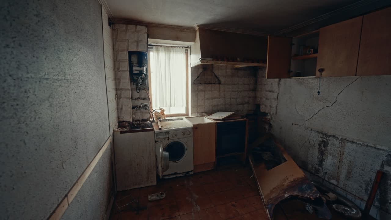 Wide Shot of a Dilapidated Abandoned Kitchen Interior