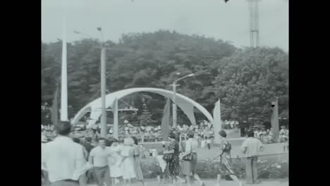 public gatherings in a park, likely in the soviet union during the 1960s or 1970s