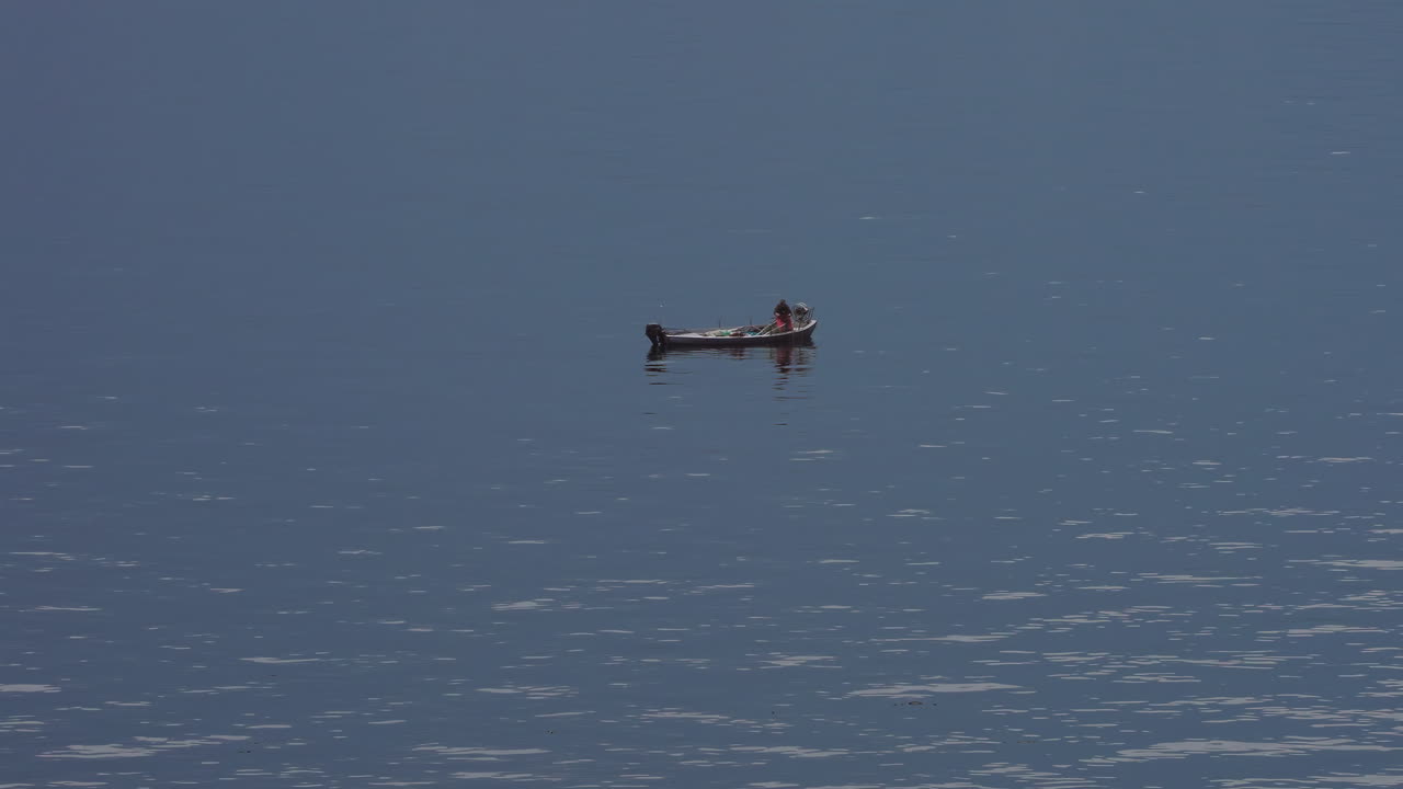 Isolated boat on Lake Como, Italy