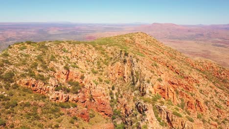 mt sonder - central australia. cinematic aerial flyover following ridge and hiking trail. filmed on dji mavic pro.