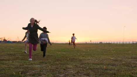 children, running and playful race at a park