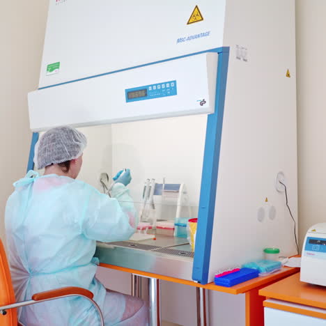 contemporary laboratory. medical assistant is working in health center on the background of modern equipment.